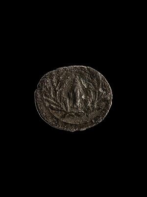 Samnite coin depicting javelin head with a laurel wreath