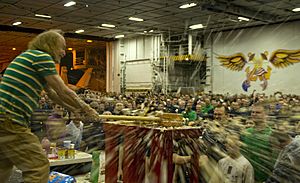 US Navy 110211-N-6320L-848 Stand-up comedian Gallagher smashes a cake for Sailors aboard the Nimitz-class aircraft carrier USS Carl Vinson (CVN 70)