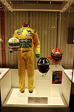 1992 Martin Brundle Racing Suit and Helmet, 1997 Damon Hill Helmet and 2000 Michael Schumacher Helmet (49254927491)