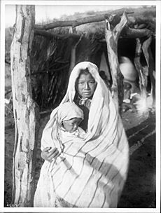 A Yaqui Indian mother holding a baby, Arizona, ca.1910 (CHS-4207)