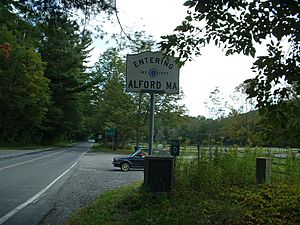 The state line at Route 71, with a Knox Trail marker beside the road sign