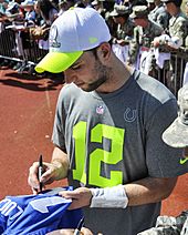 Andrew Luck signing autographs at 2014 Pro Bowl