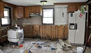 Coastal Storm ^ Flooding ^ Hurricane-Tropical Storm ^ Severe Storm - Vandemere, N. C. , September 14, 2011 -- A kitchen is gutted by volunteers to remove the mold. FEMA works with v - DPLA - 47cc8f77c700b793eda12e7d7e145eda