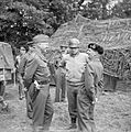 General Montgomery with Generals Patton (left) and Bradley (centre) at 21st Army Group HQ, Normandy, 7 July 1944. B6551