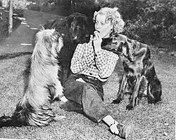 Jeanette MacDonald with her three pet dogs