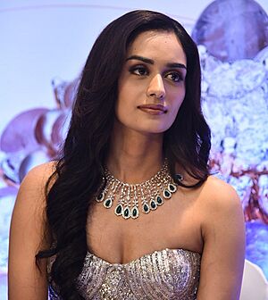 Manushi Chhillar attends a press meet for the Gem and Jewellery Export Promotion Council of India (GJEPC) in 2023 (cropped).jpg