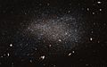 NGC 4789A, a subtle swarm