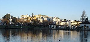 A view towards the Grand Avenue side of Lake Merritt. The apartments in view are part of the Adams Point neighborhood and are typical of the dense housing found in the area.
