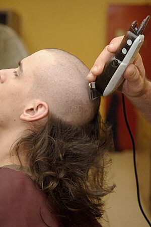 Recruit having head shaved