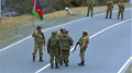 Russian peacekeepers and Azerbaijani military personnel near Vank village