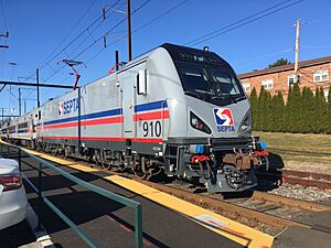 SEPTA ACS-64 910 inbound departing Hatboro Station