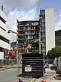 Side view of the tearing down of 61 Molesworth Street