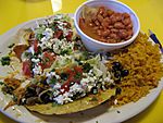 Tacos, rice, and borracho beans