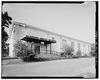 EXTERIOR VIEW, FRONT (EAST) ELEVATION - Alabama Mining Museum, Dora School, Gymnasium, Between U.S. 78 and Burlington Northern Railroad, Dora, Walker County, AL HABS ALA,64-DORA,2A-1.tif