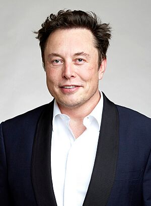 Portrait of Elon Musk, a white, middle-age man with short, dark hair, wearing a morning coat