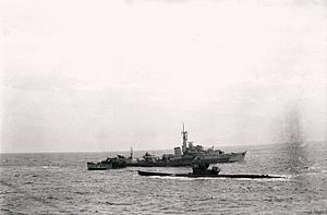 German submarine U-516 surrenders to HMS Cavendish (R15), 10 May 1945 (A 28552).jpg