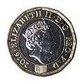 One pound head side