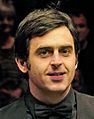 Stephen Maguire, Ronnie O’Sullivan, and Michaela Tabb at German Masters Snooker Final (DerHexer) 2012-02-05 05 cropped