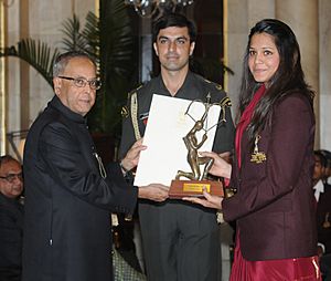 The President, Shri Pranab Mukherjee presenting the Arjuna Award for the year-2012 to Ms. Deepika Pallikal for Squash, in a glittering ceremony, at Rashtrapati Bhavan, in New Delhi on August 29, 2012
