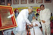 The Vice President Shri Bhairon Singh Shekhawat conferring the 'Dnyaneswar Award' to noted & veteran social worker Shri Nanaji Deshmukh, in New Delhi on June 1, 2005