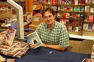 Brandon Sanderson with a German copy of Elantris