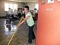 Grace Shrock-Hurst mops floor Our Community Place in Harrisonburg VA May 2008