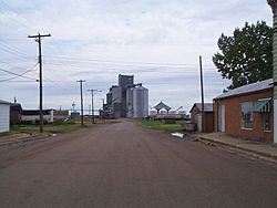 View of the main road looking towards a grain elevator