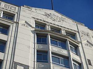 Montgomery Building looking up at "M" emblem