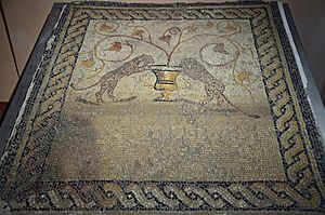 Mosaic pavement depicting two panthers drinking from a krater used to mix wine with water, from the crater a vine grows, found in Sant'Antioco, 2nd or 3rd century AD, Sant'Antioco Archaeological Museum, Sardinia (16568237797)