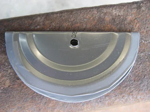 Shepherd's whistle, homemade from a steel can lid and duct tape.webp