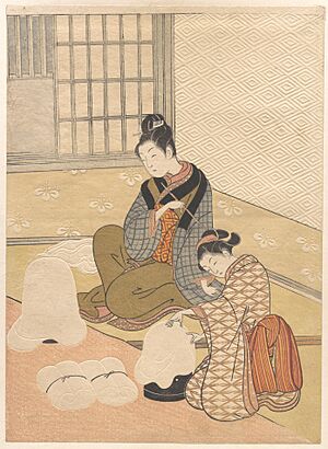 Suzuki Harunobu - Evening Snow on the Heater