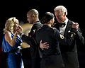 Vice President Joe Biden, right, dances with U.S. Army Staff Sgt. Keesha Dentino as Jill Biden, left, dances with Navy Petty Officer 3rd Class Patrick Figuero at the Commander in Chief's Ball at the Washington 130121-A-TT930-055