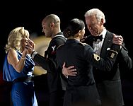 Vice President Joe Biden, right, dances with U.S. Army Staff Sgt. Keesha Dentino as Jill Biden, left, dances with Navy Petty Officer 3rd Class Patrick Figuero at the Commander in Chief's Ball at the Washington 130121-A-TT930-055