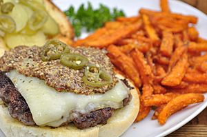 Cheeseburger with creole mustard and sweet potato fries
