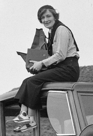 Dorothea Lange atop automobile in California (restored) (cropped).jpg