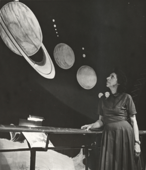 Frances Wright examining a planetary exhibit