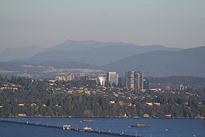 Medina, pictured front just after the Evergreen Point Floating Bridge, with the Bellevue skyline behind