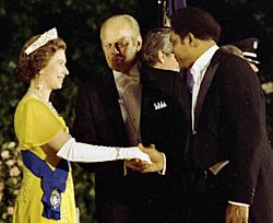 President Gerald R. Ford Introducing Willie Mays to Queen Elizabeth II in the Receiving Line Prior to a State Dinner in Honor of Her Majesty - NARA - 45644165 (cropped)