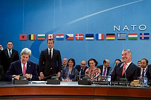 Secretary Kerry Puts the Cap Back on His Pen After Signing an Accession Protocol to Continue Montenegro's Admission to NATO in Brussels (27045333901)