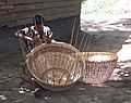 Woman weaving baskets near Lake Ossa