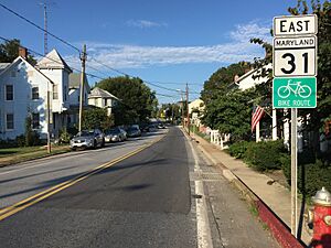 2016-08-20 18 07 25 View east along Maryland State Route 31 (Main Street) at Green Valley Road in New Windsor, Carroll County, Maryland