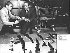 ATF investigators display weapons seized
