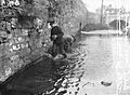Searching the River Tolka in Dublin for arms