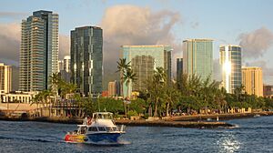 Skyline and boat from Kaka'ako Waterfront Park