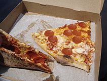 Slices of thin-crust New York style pizza