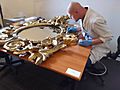 06 Restoration of gilded mirror in Muzeum Gornoslaskie, Bytom, Poland - furniture restorer working