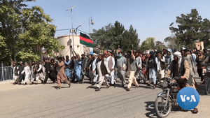 Armed Afghan civilians during the 2021 Taliban offensive