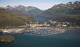 Aerial view of central Cordova, Eyak Lake and the portion of the Chugach Mountains surrounding the city.