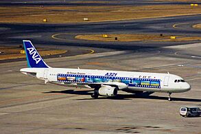 JA101A 1 A321-131 ANA (Film) HND 13JAN99 (5898677984)