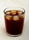 Tumbler of cola with ice.jpg